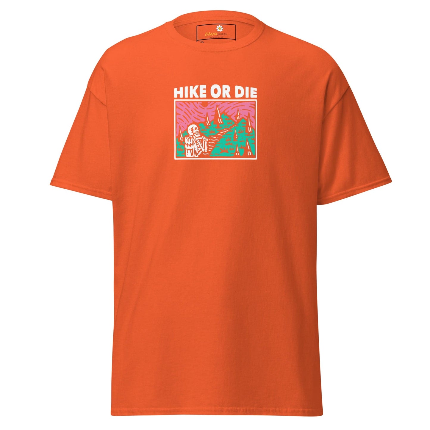 Orange t-shirt with ’Hike or Die’ graphic.